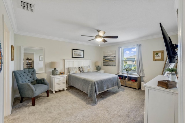 bedroom featuring light colored carpet, ceiling fan, and crown molding