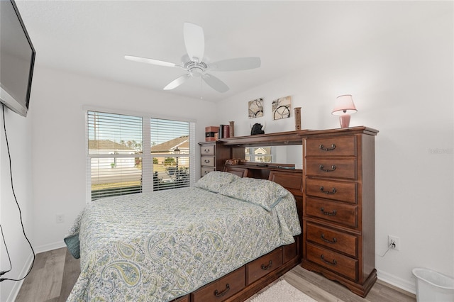 bedroom featuring ceiling fan and light wood-type flooring