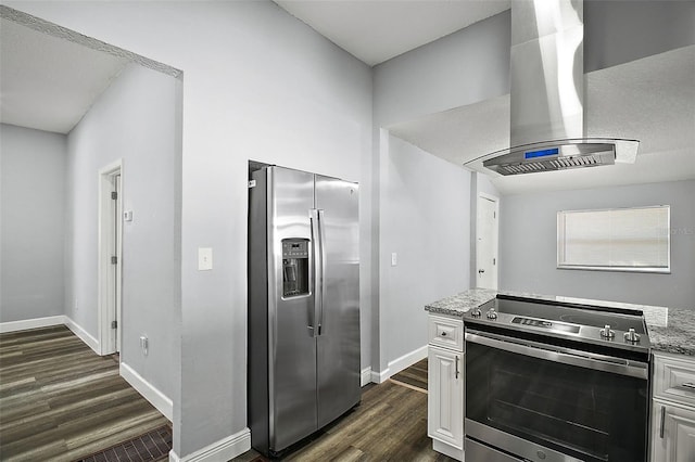 kitchen with white cabinetry, light stone countertops, dark hardwood / wood-style floors, island range hood, and appliances with stainless steel finishes