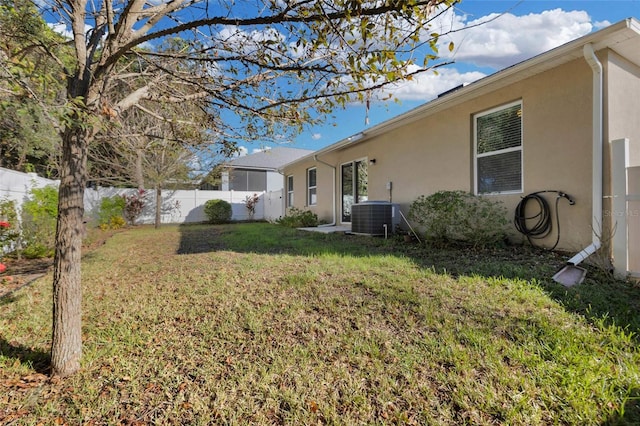 view of yard featuring central AC