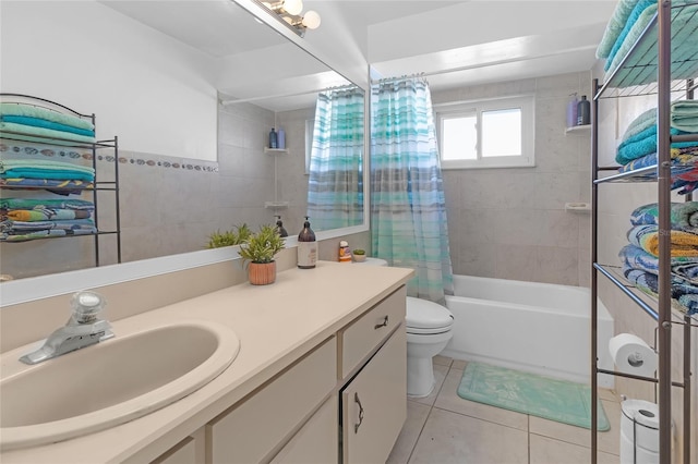 full bathroom with tile patterned flooring, vanity, toilet, and shower / bath combo with shower curtain