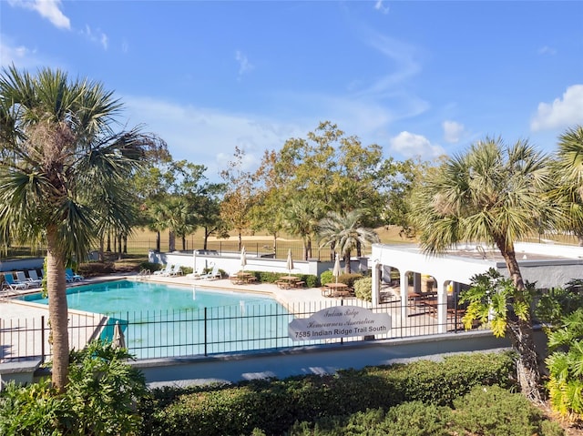 view of swimming pool featuring a patio area