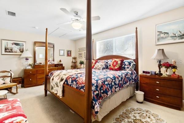 bedroom featuring ceiling fan and light colored carpet