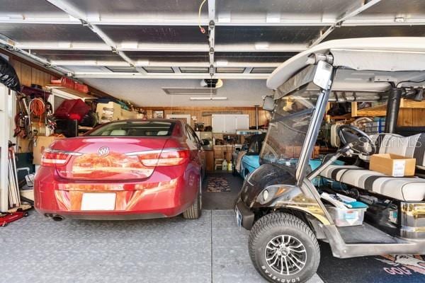 garage featuring a garage door opener