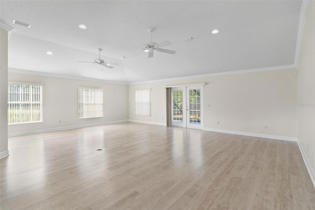 empty room with light wood-type flooring, ceiling fan, and crown molding