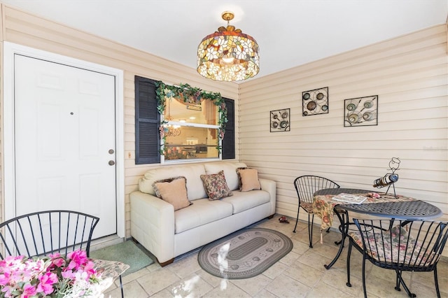 living room with a chandelier