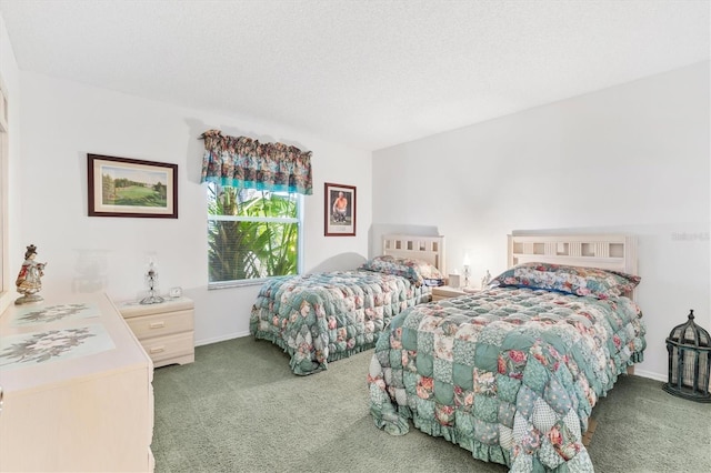 carpeted bedroom featuring a textured ceiling