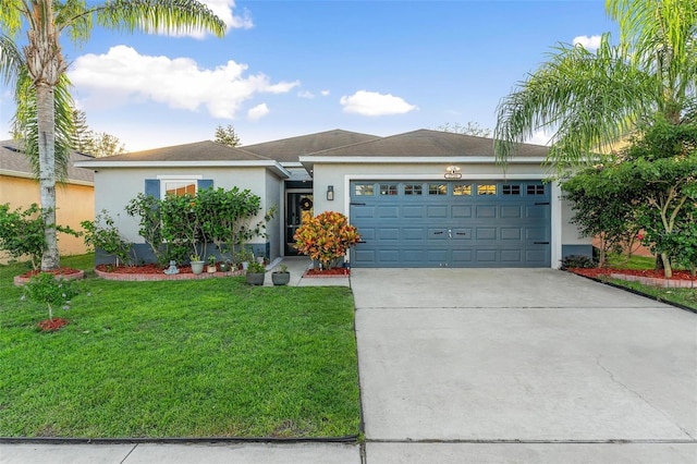 ranch-style home with a garage and a front yard