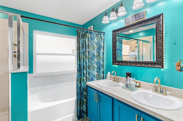 bathroom featuring separate shower and tub and vanity