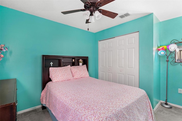 bedroom featuring ceiling fan, carpet floors, and a closet