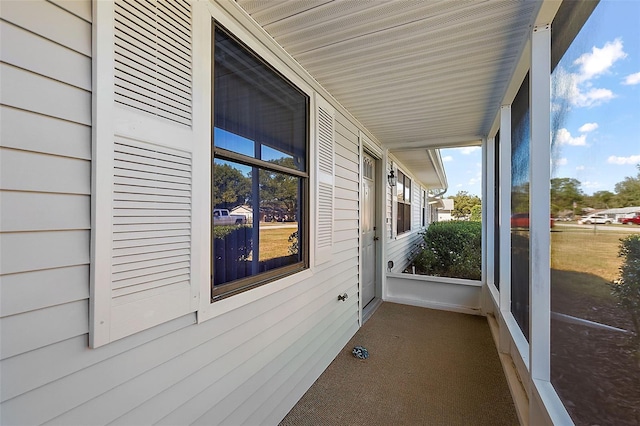 unfurnished sunroom with a wealth of natural light