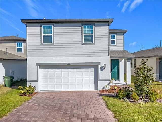 front of property featuring a garage