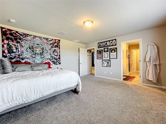 carpeted bedroom with a textured ceiling