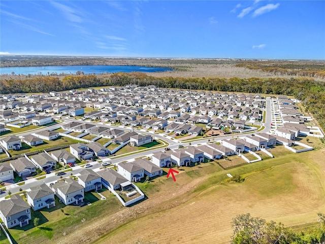 drone / aerial view with a water view