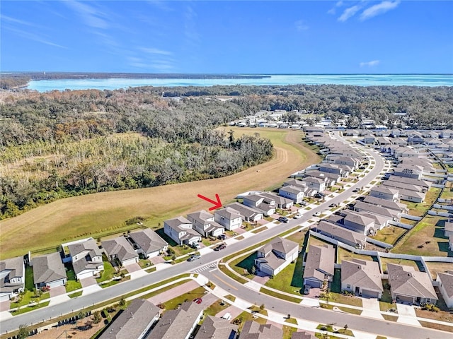 drone / aerial view with a water view