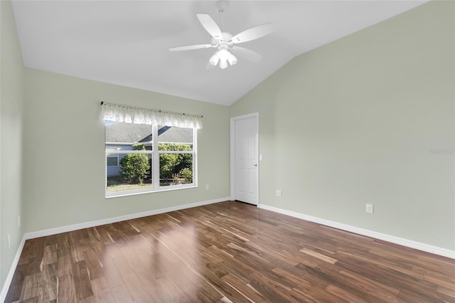 unfurnished room with dark hardwood / wood-style floors, ceiling fan, and lofted ceiling