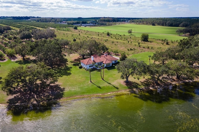 aerial view with a rural view and a water view