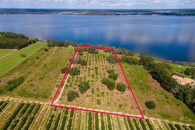 aerial view featuring a water view and a rural view