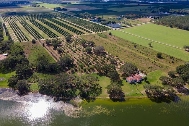 bird's eye view with a rural view and a water view