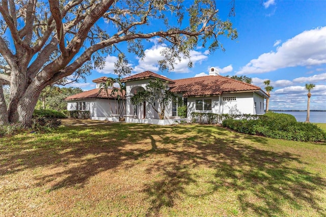 exterior space with a front lawn