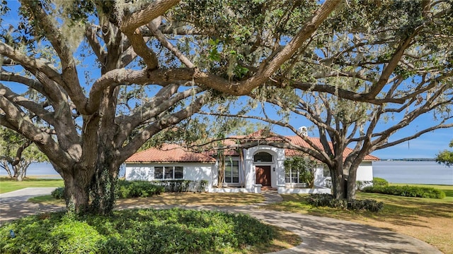 view of front of home featuring a water view