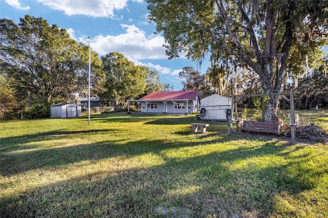 view of yard with a storage shed