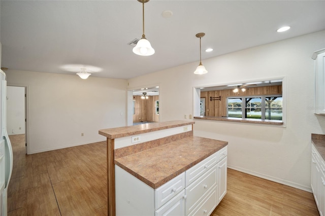 10285 NE 218th Lane Rd, Fort Mc Coy, FL 32134 - kitchen featuring a ceiling fan, light wood-style floors, a center island, and recessed lighting