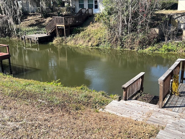 view of dock with a water view