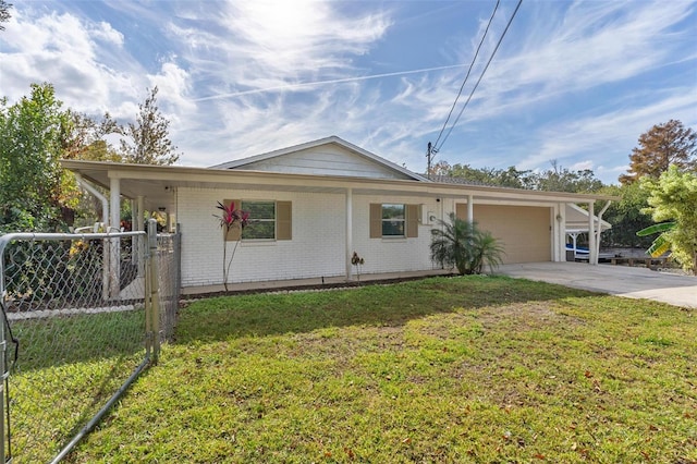 single story home featuring a garage and a front lawn