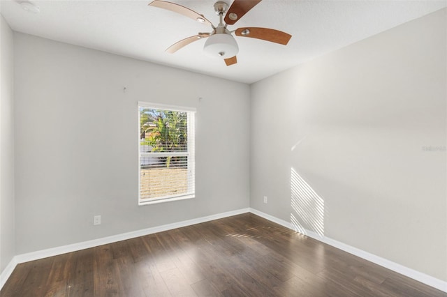 empty room featuring dark hardwood / wood-style floors