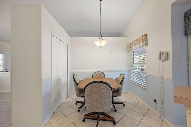 dining area with light tile patterned floors