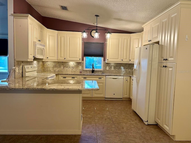 kitchen with sink, hanging light fixtures, tile patterned flooring, kitchen peninsula, and white appliances