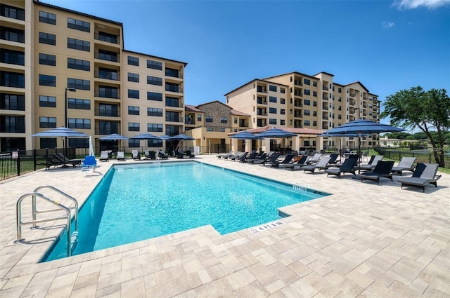 view of pool featuring a patio