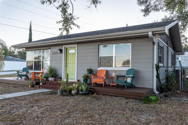 view of front of property with a wooden deck