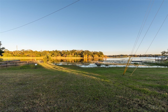 view of yard featuring a water view and a rural view