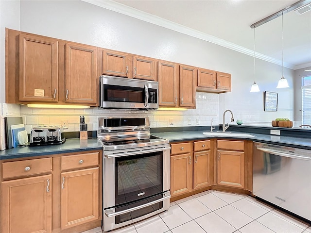 kitchen with sink, decorative backsplash, ornamental molding, light tile patterned flooring, and stainless steel appliances