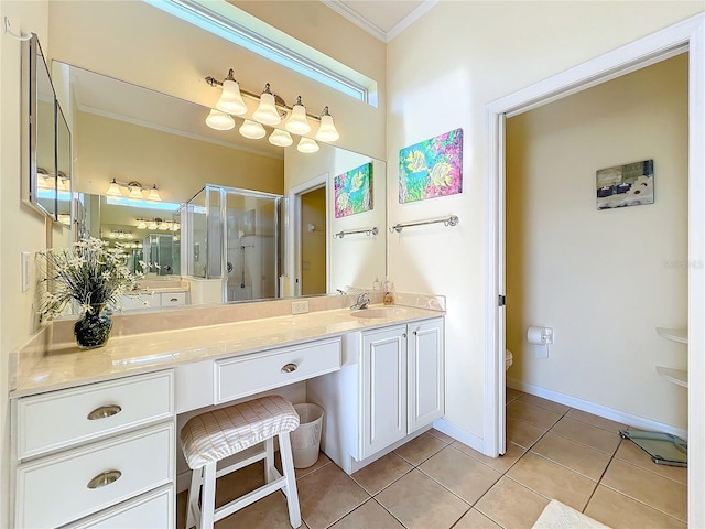 bathroom with vanity, a shower with door, crown molding, tile patterned flooring, and toilet