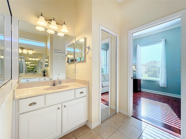 bathroom featuring vanity and wood-type flooring