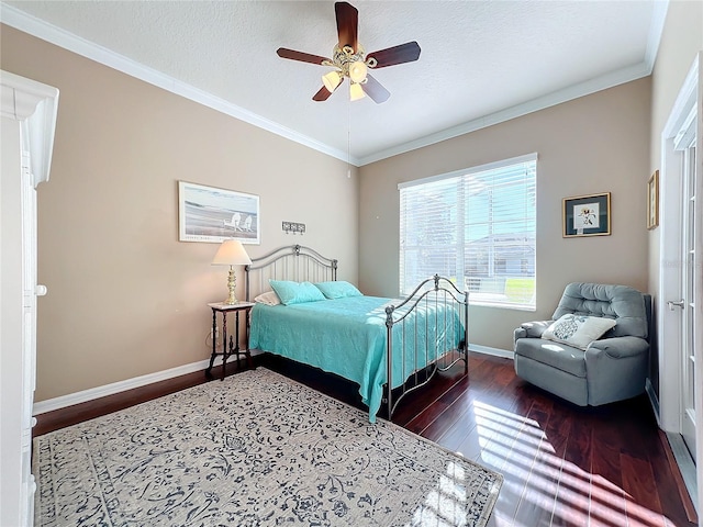 bedroom featuring a textured ceiling, ceiling fan, crown molding, and dark wood-type flooring