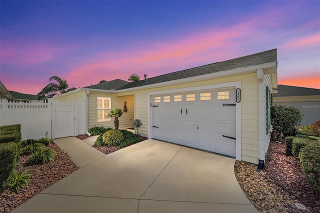 ranch-style home with a garage