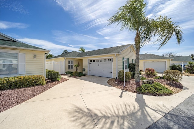 ranch-style home featuring a garage