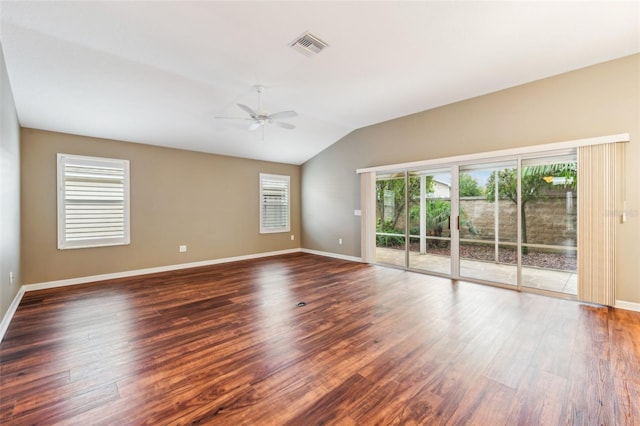 unfurnished room with ceiling fan, dark hardwood / wood-style flooring, and vaulted ceiling