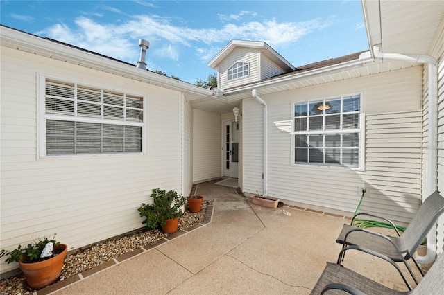 property entrance with a patio