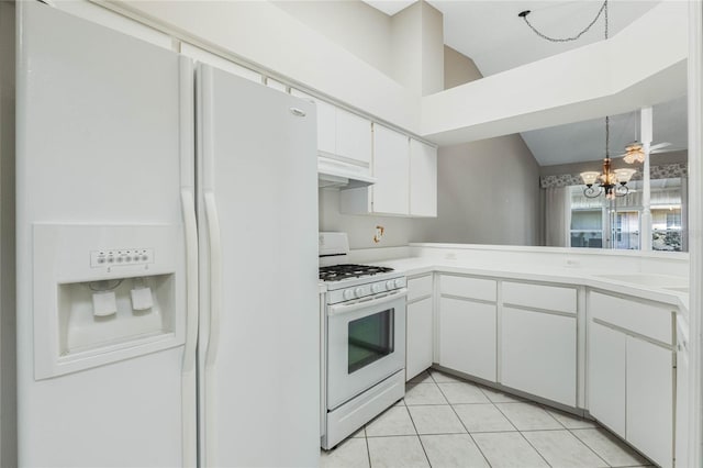 kitchen with an inviting chandelier, light tile patterned flooring, ventilation hood, white appliances, and white cabinets