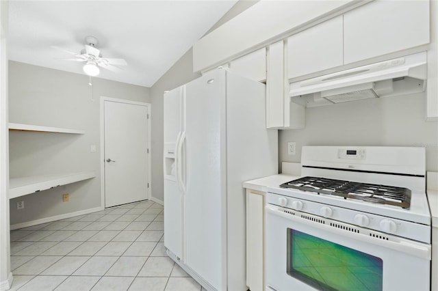 kitchen featuring lofted ceiling, white cabinets, light tile patterned flooring, and white appliances