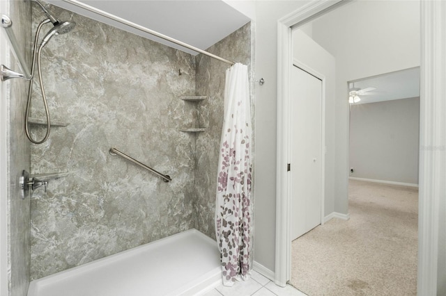 bathroom featuring a shower with curtain, tile patterned floors, and ceiling fan