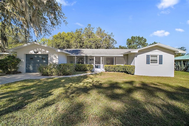 ranch-style house with a garage and a front lawn