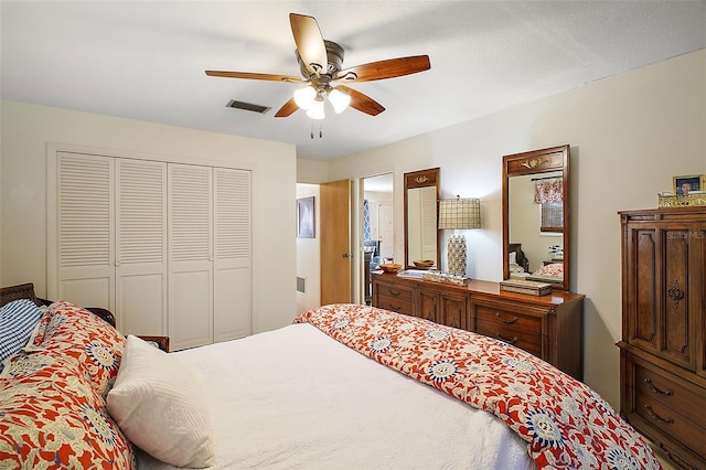 bedroom with a closet and ceiling fan