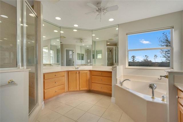 bathroom featuring tile patterned flooring, vanity, separate shower and tub, and ceiling fan