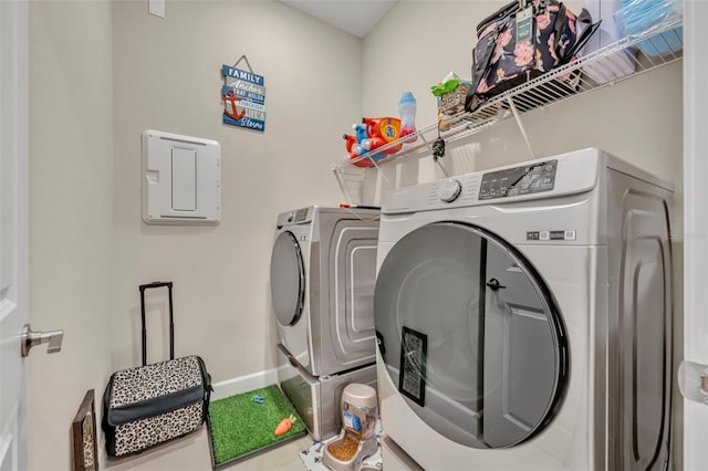 washroom with washing machine and dryer